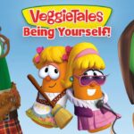 Promotional image for VeggieTales: Being Yourself! featuring colorful veggie characters in costumes with a microphone and broom.