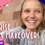 Smiling young woman in a gray sweater on a pink thumbnail with bold white text: ‘SURPRISE ROOM MAKEOVER!’, plus ‘Life of Riley’ and an ‘exclusive’ banner
