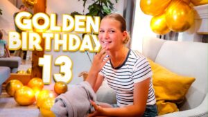 Teen girl at a birthday party with gold balloons; overlay text reads 'GOLDEN BIRTHDAY 13'.