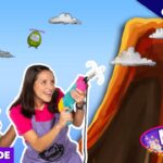 Thumbnail for a kids' episode: two people with a large water rifle in front of a cartoon volcano; shows 'Yippee' and 'Maggie’s Market' branding with 'Full Episode' label.
