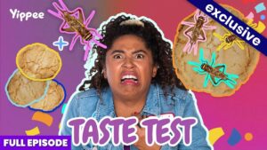 Woman with a shocked expression during a colorful taste-test thumbnail with cookies and cartoon bugs on a purple-pink background.