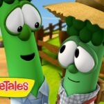Two animated green vegetable characters from VeggieTales wearing straw hats on a sunny farm, smiling at each other with the VeggieTales logo in the corner.