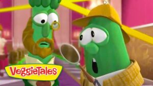 Two green VeggieTales characters in a bright setting, one with a monocle and beard and the other wearing a yellow hat and scarf, holding a ladle; VeggieTales logo visible.
