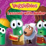 VeggieTales: Lessons with Junior — group of cheerful veggie characters posing on a purple patterned background with the title text above.