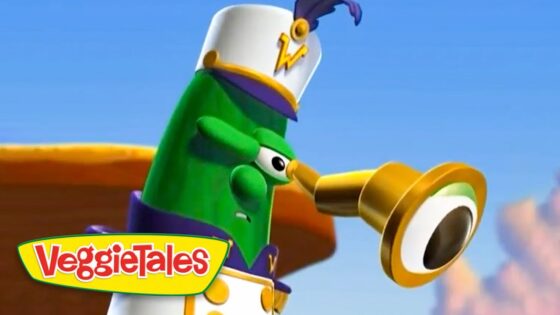 Green veggie chef character blowing a brass horn with a VeggieTales logo in the bottom-left corner, set against a blue sky.