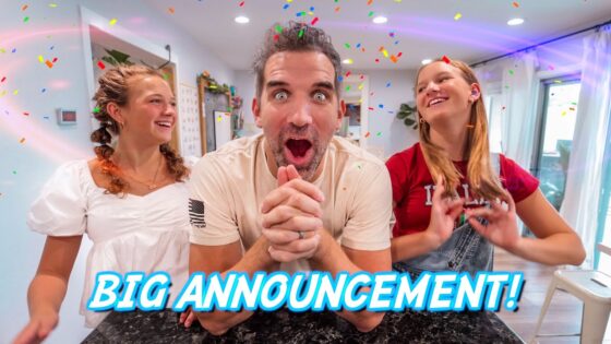 Three excited friends celebrate with confetti indoors, center person clasping hands and shouting, 'Big Announcement!' overlay visible in blue text across bottom.