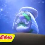 Underwater scene with a VeggieTales character wearing a blue hood and green face, foregrounded against a blue background; VeggieTales logo visible in the corner.