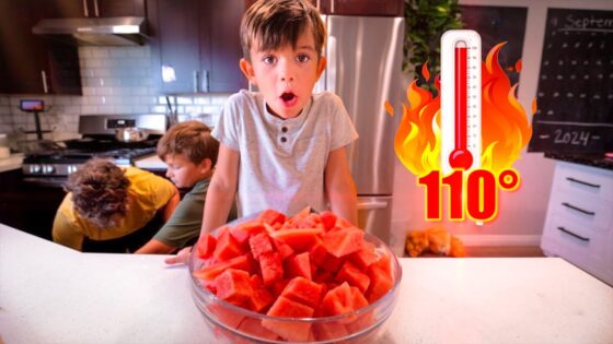A boy leans toward a bowl of watermelon on a kitchen island with a surprised expression; two other kids in the background, and a flame icon with a thermometer reading 110° to the right.