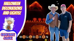 Thumbnail with two men in cowboy outfits beside a pumpkin-lit house at night; left purple panel reads 'HALLOWEEN DECORATIONS AND LIGHTS!' with a Cowboy Jack logo.