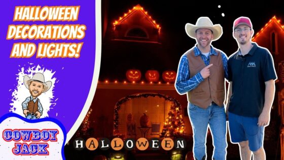 Thumbnail with two men in cowboy outfits beside a pumpkin-lit house at night; left purple panel reads 'HALLOWEEN DECORATIONS AND LIGHTS!' with a Cowboy Jack logo.