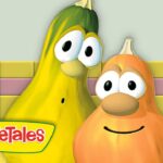 Two VeggieTales characters pose together in a yellow tiled set with the VeggieTales logo in the foreground.