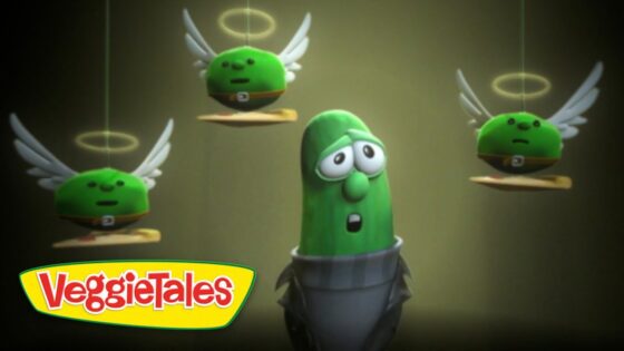 Animated green cucumber character stands center, looking worried as three winged green peas with halos float around him, VeggieTales logo in the bottom left corner.