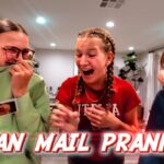 Thumbnail of three kids indoors laughing during a fan mail prank; left kid in green hoodie holds a card, center girl with braids laughs, right boy smiles; bold 'FAN MAIL PRANK!' caption at bottom.