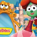 VeggieTales scene: a green female veggie in a pink dress beside a gold ornate mirror with a castle in the background.