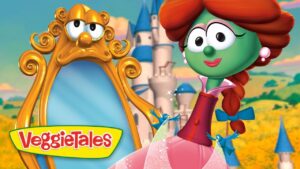 VeggieTales scene: a green female veggie in a pink dress beside a gold ornate mirror with a castle in the background.
