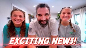 Three people smile at the camera in a bright room with a bold red 'EXCITING NEWS!' banner across the bottom, as a video thumbnail.