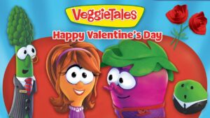 VeggieTales Valentine’s Day banner with animated veggies smiling in front of a large red heart and the title text above them.