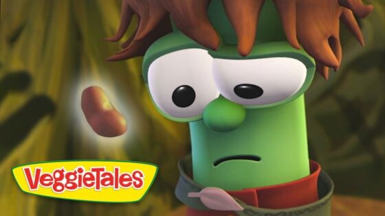 Green veggie character with brown hair and a puzzled expression in a forest, VeggieTales logo in the corner