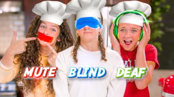 Three kids in chef hats pose in a kitchen; left points to a red 'MUTE' sticker over her mouth, middle wears a blue blindfold, right has green headphones with 'DEAF' text nearby.