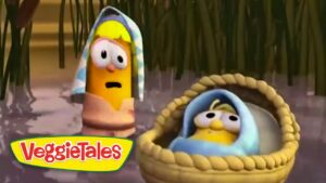 VeggieTales logo in the corner with two cartoon vegetables in the rain; one wearing a striped towel hood and the other inside a woven basket.
