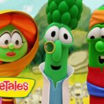 Three green veggie characters from VeggieTales stand together outdoors, with the VeggieTales logo in the corner and a colorful, friendly scene behind them.