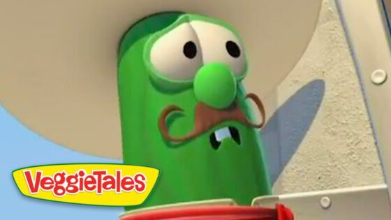 Larry the Cucumber from VeggieTales with a brown mustache and googly eyes.