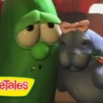 Close-up of two VeggieTales characters—a green cucumber and a gray hippo with a bow tie—nuzzling each other, with the VeggieTales logo bottom left.