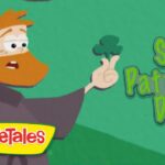 VeggieTales character with an orange beard holding up a shamrock beside the text 'St. Patrick's Day' on a green background.