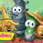 Group of VeggieTales characters posing in a bright, whimsical garden with the VeggieTales logo in the foreground.