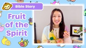 Smiling woman with a fruit basket (bananas, grapes, apples) in a thumbnail for a Bible Story about the Fruit of the Spirit.