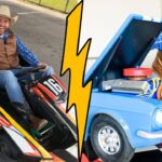 Man in a cowboy hat and blue plaid shirt sits in a yellow/black go-kart, waving at the camera; a yellow zigzag graphic divides the image from a blue open-engine car on the right, with the same man smiling nearby.