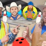 Two men in safety vests and hard hats smile and point at each other in a bowling alley backdrop with pins and cartoon icons.