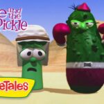 Title screen from VeggieTales: Dave and the Giant Pickle, showing two anthropomorphic cucumbers boxing in a desert, with the 'Dave and the Giant Pickle' and 'VeggieTales' logos.