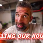 Man in a garage looking at the camera with a surprised expression; bold red and white text reads 'SELLING OUR HOUSE?' across the bottom.