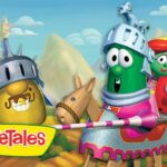 Cartoon VeggieTales characters dressed as knights ride a wooden horse in a bright valley with a castle in the background.