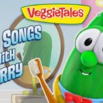 Larry the cucumber from VeggieTales, wearing a red bow tie and holding a toothbrush in a bright, playful scene with the 'Silly Songs with Larry' title above him.