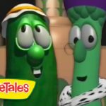 Two VeggieTales animated vegetables with oversized eyes stand together, with the VeggieTales logo on the left.