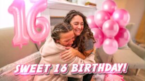 Two people share a hug at a Sweet 16 birthday party, with pink balloons and the text 'Sweet 16 Birthday!' in the scene.