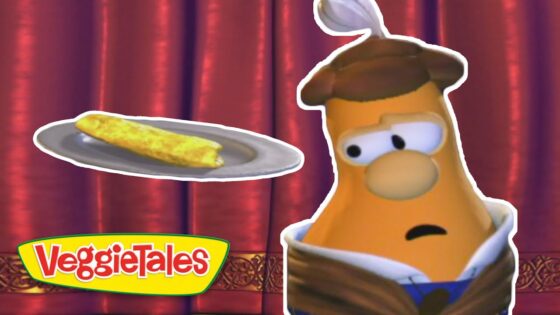 VeggieTales character wearing a chef hat looks worried as a corn on the cob floats on a plate nearby against a red curtain background.