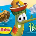 VeggieTales poster featuring Pistachio the carrot with a boat and a whale in the ocean