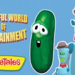 Video thumbnail for VeggieTales titled The Wonderful World of Auto-Tainment, showing a green cucumber character and two cartoon robots on a blue dotted background with the VeggieTales logo there.