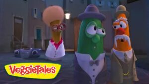 Three VeggieTales characters in tuxedos stand in a dim alley at night, with a boombox on the ground nearby.