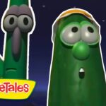 Two green vegetable characters with surprised expressions at night, VeggieTales logo visible in the corner.