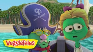 Two green VeggieTales characters in a boat at a tropical beach; one wears a pirate hat and yellow glasses, the other looks surprised; VeggieTales logo visible on the left.