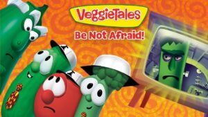 VeggieTales Be Not Afraid! promo: four animated vegetables look alarmed as a grim green figure appears on a monitor.