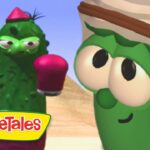 Two green VeggieTales characters wearing boxing gloves boxing in a desert setting, with the VeggieTales logo in the foreground.