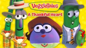 VeggieTales cover art: a purple central character with two green veggie friends in hats against a yellow background with the title 'A Thankful Heart'