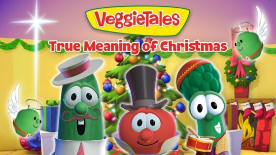 VeggieTales characters in a festive Christmas scene with a decorated tree, presents, stockings, and the logo 'VeggieTales True Meaning of Christmas'.