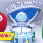 Red tomato and green cucumber cartoon characters stand beside a futuristic ride labeled 'Auto-Tainment' at VeggieTales, with a globe centerpiece in the background.