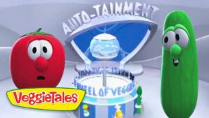 Red tomato and green cucumber cartoon characters stand beside a futuristic ride labeled 'Auto-Tainment' at VeggieTales, with a globe centerpiece in the background.